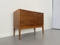 Rosewood and teak chest of drawers by Uniflex