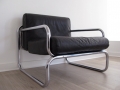 A leather & chrome lounge chair. OMK Rodney Kinsman