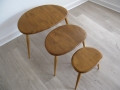 A solid elm nest of pebble tables. Lucian Ercolani for Ercol