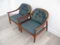 A pair of teak lounge chairs. Greaves & Thomas