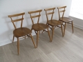 4 Ercol 'green dot' adult stacking chairs