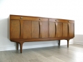 An unusual walnut sideboard