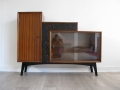 An unusual 1950s cabinet with carved drawers