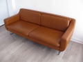 A tan leather 'Aspen' sofa by Terence Conran