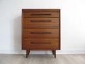 A 1950s teak chest of drawers