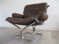 Danish leather, chrome and rosewood 'falcon' style chair