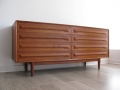 A large Danish teak chest of drawers