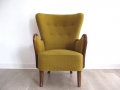 A 1940s highback armchair